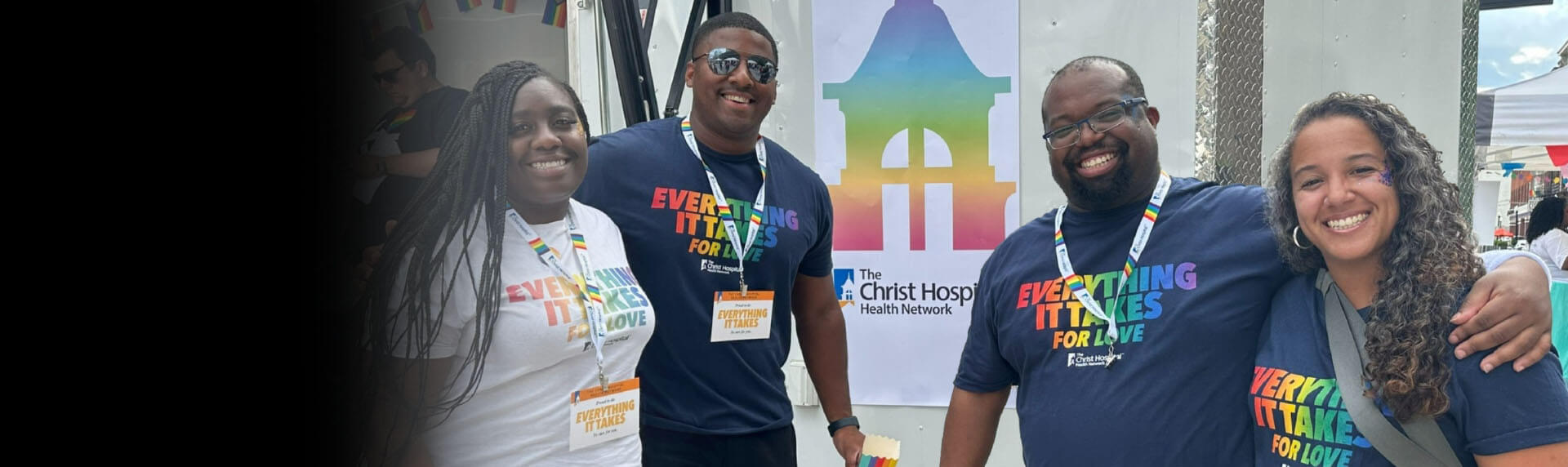 A group of diverse Christ Hospital employees smiling with the headline: “Everything is takes so everyone can connect”