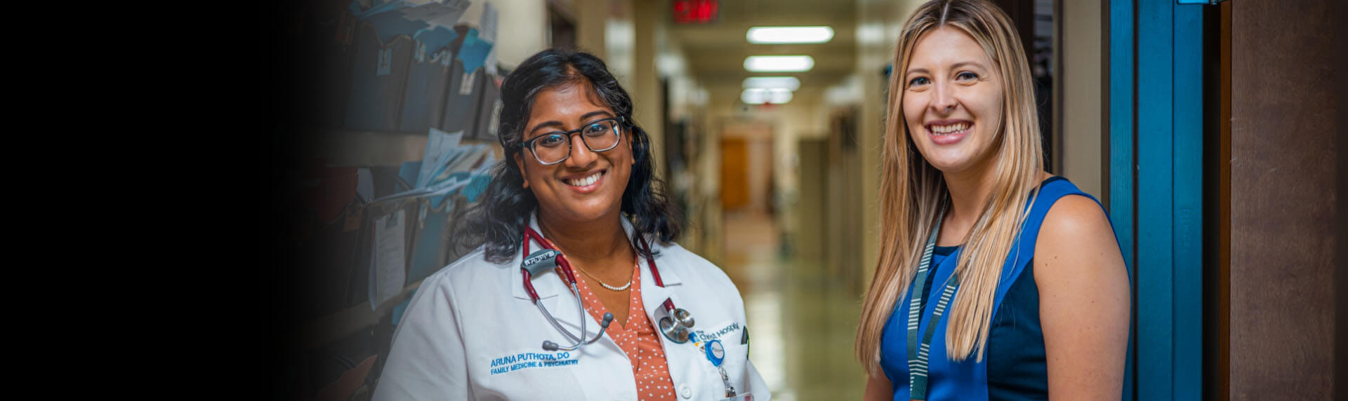 Two Christ Hospital medical professionals smiling with the headline: “Everything it takes so everyone can excel”