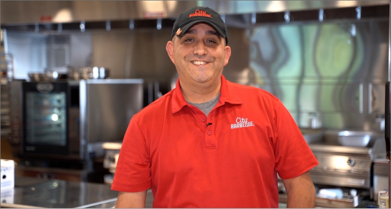John helps manage catering events for City Barbeque.