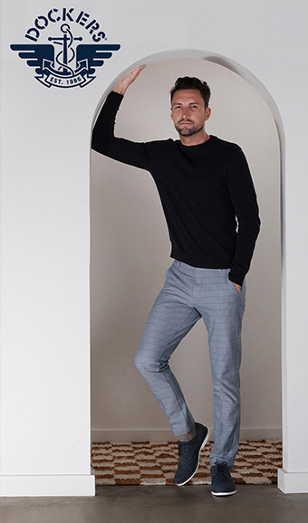 Male posing in Dockers brand shoes/apparel
