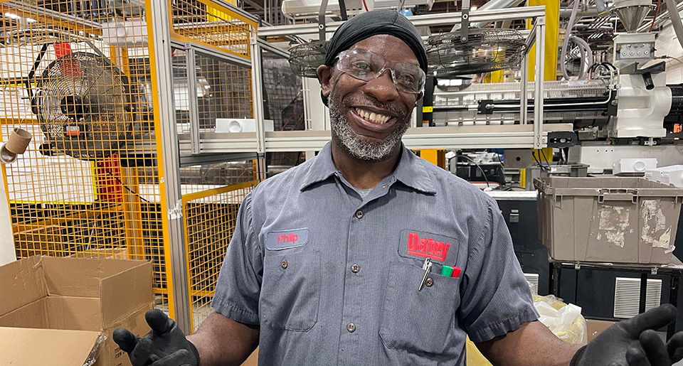 A smiling Oatey employee.