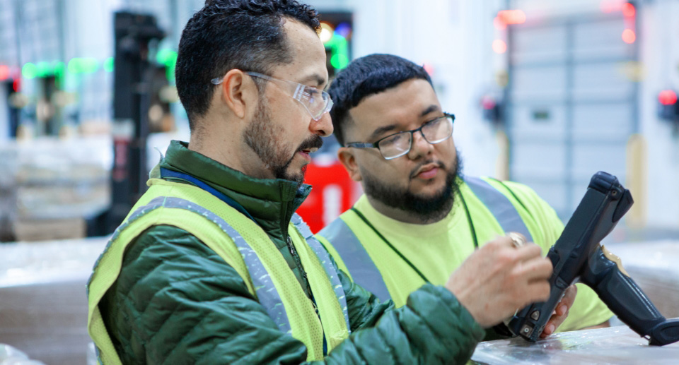 Oatey distribution employees talking.