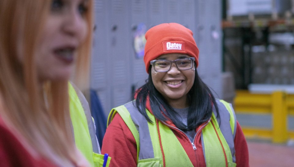 A smiling Oatey employee.