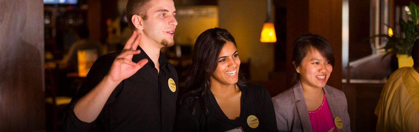 A group of Olive Garden employees in the restaurant