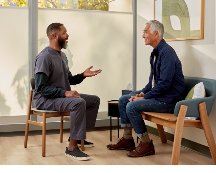 One Medical physician speaking to a patient.