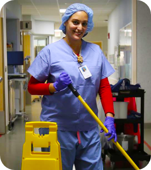 Parrish Healthcare environmental services employee smiling.