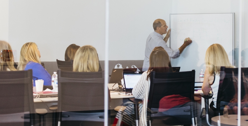  	PatientPoint employees attending a presentation.