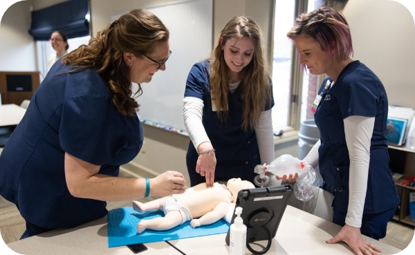 Students working with medical professionals