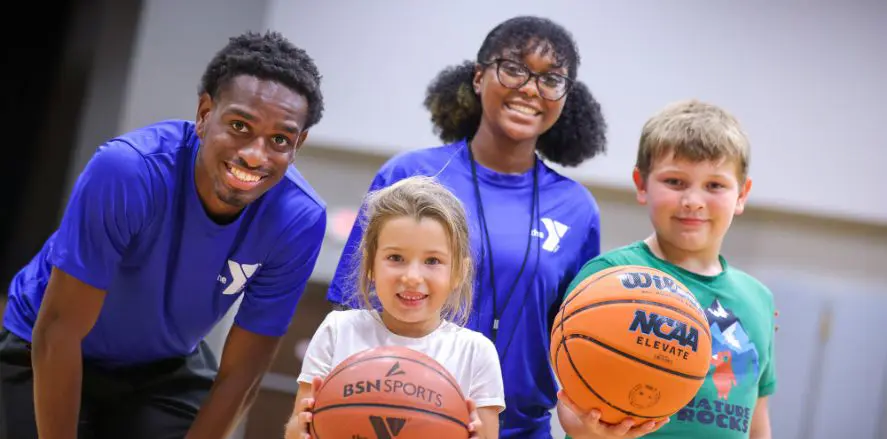 YMCA Triangele coaches with kids
